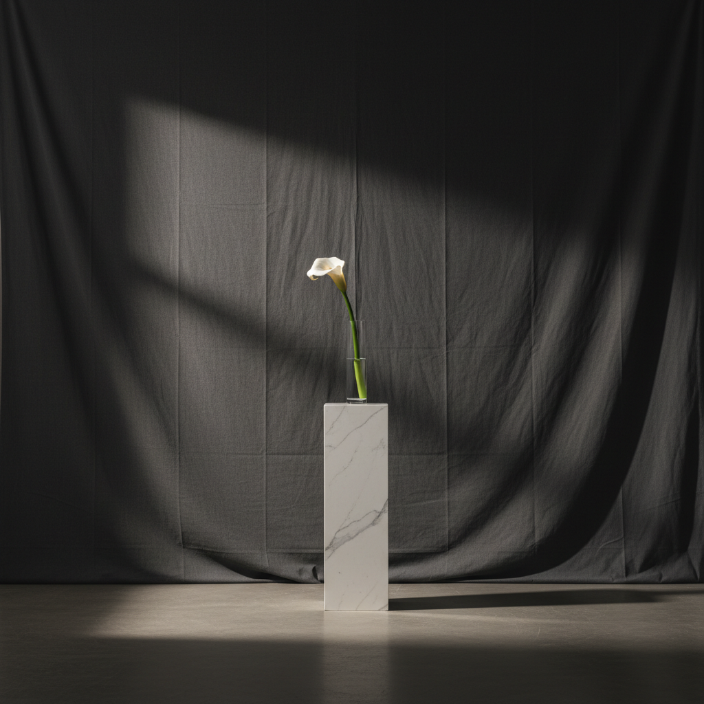 A sleek, minimalist vogue style photo booth backdrop in a luxurious event setting with soft, directional lighting.